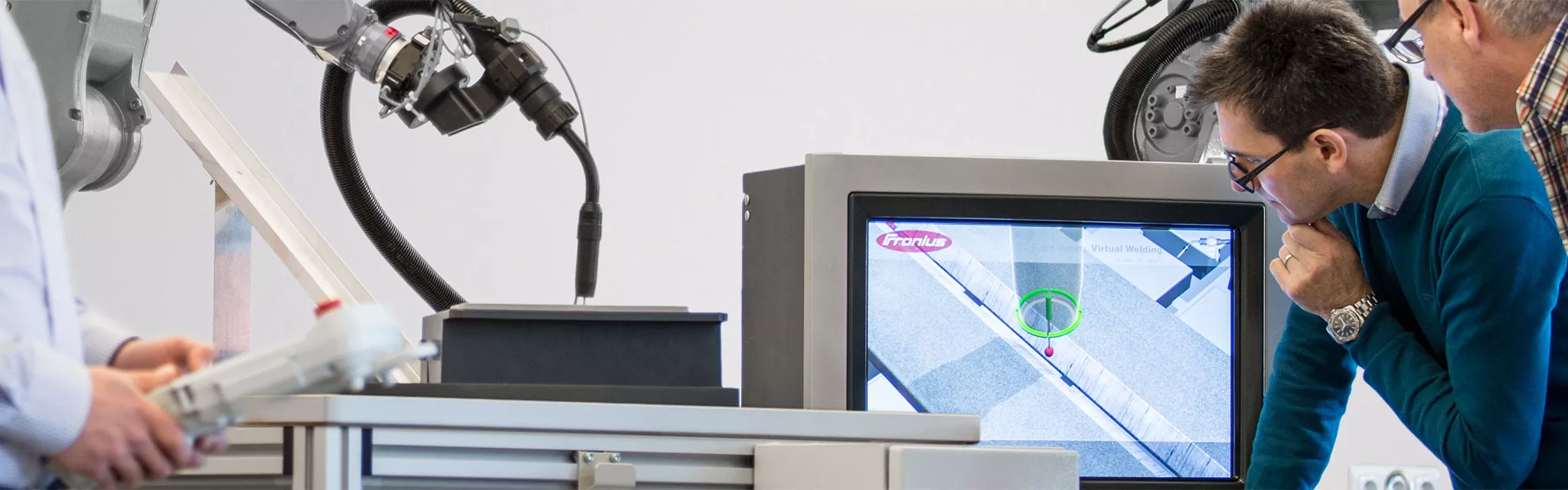 Kunden bei unserer Robotics Schulung. Robotics Schulung, Fronius
