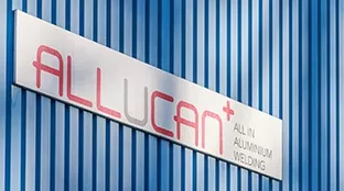 ALLUCAN sign on company building
